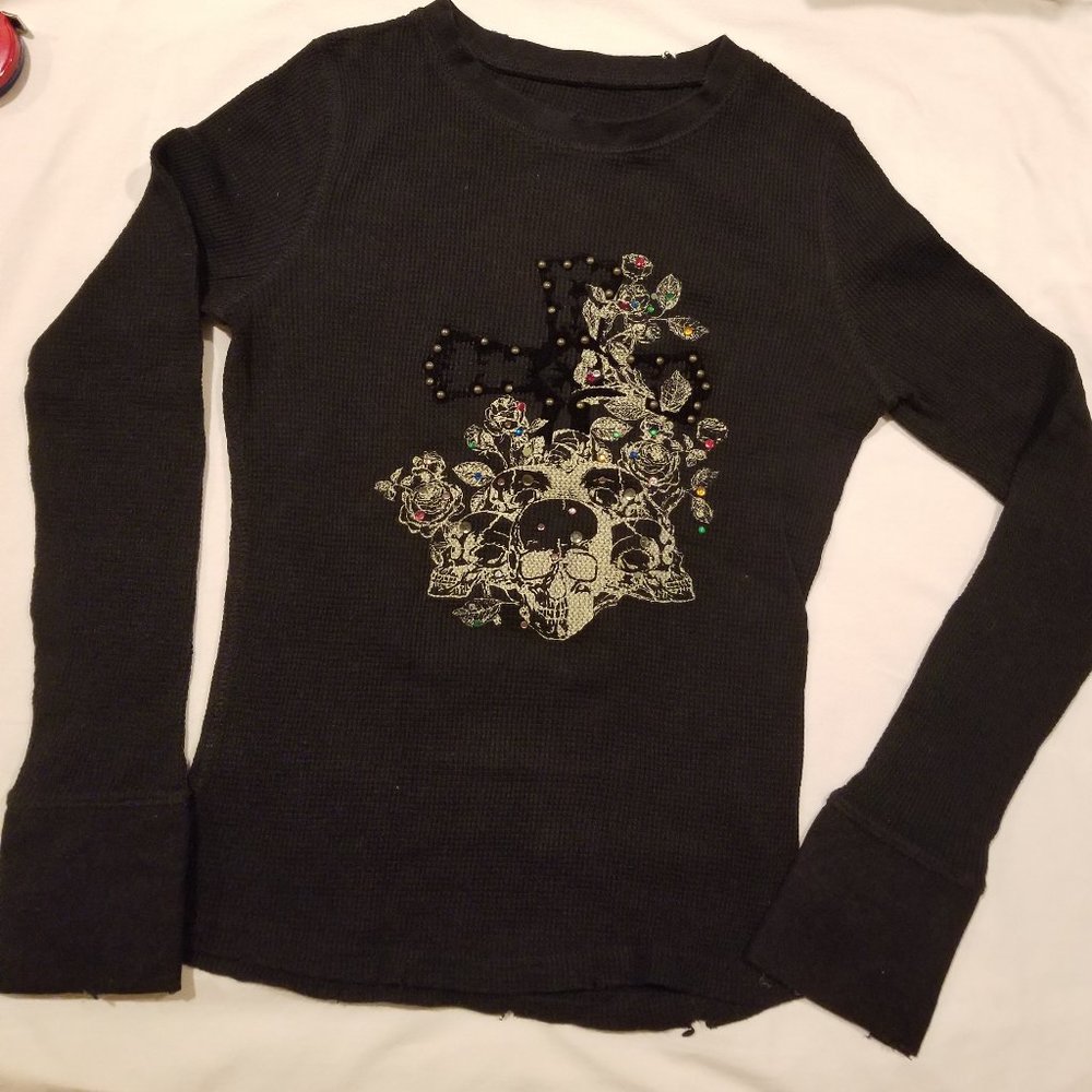 European boutique bought. Black t-shirt, long sleeves. With crystals and…